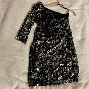 Black/silver sequin dress.